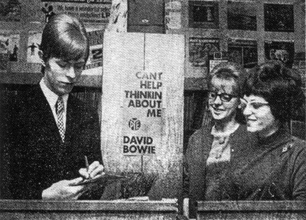 David Bowie signing singles at Cranes, Birmingham, 5 March 1966